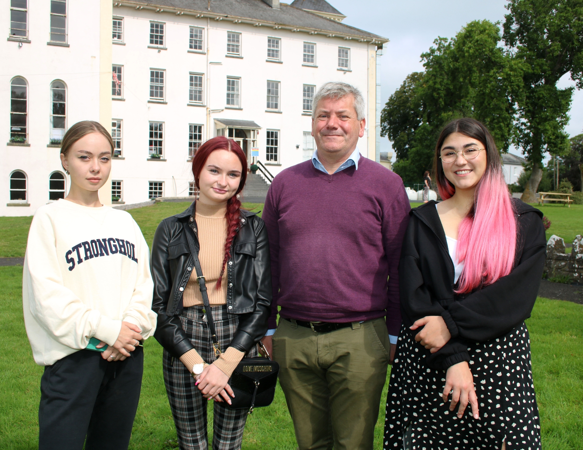 Paul Walsh, general manager of the centre with members of the resident support team, Olya Somova, Holly O'Brien and Karyna Airabetova | PICTURE: Adrian Butler