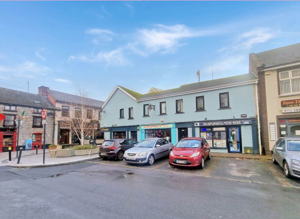 PICTURES Three retail units with apartments overhead go up for sale in