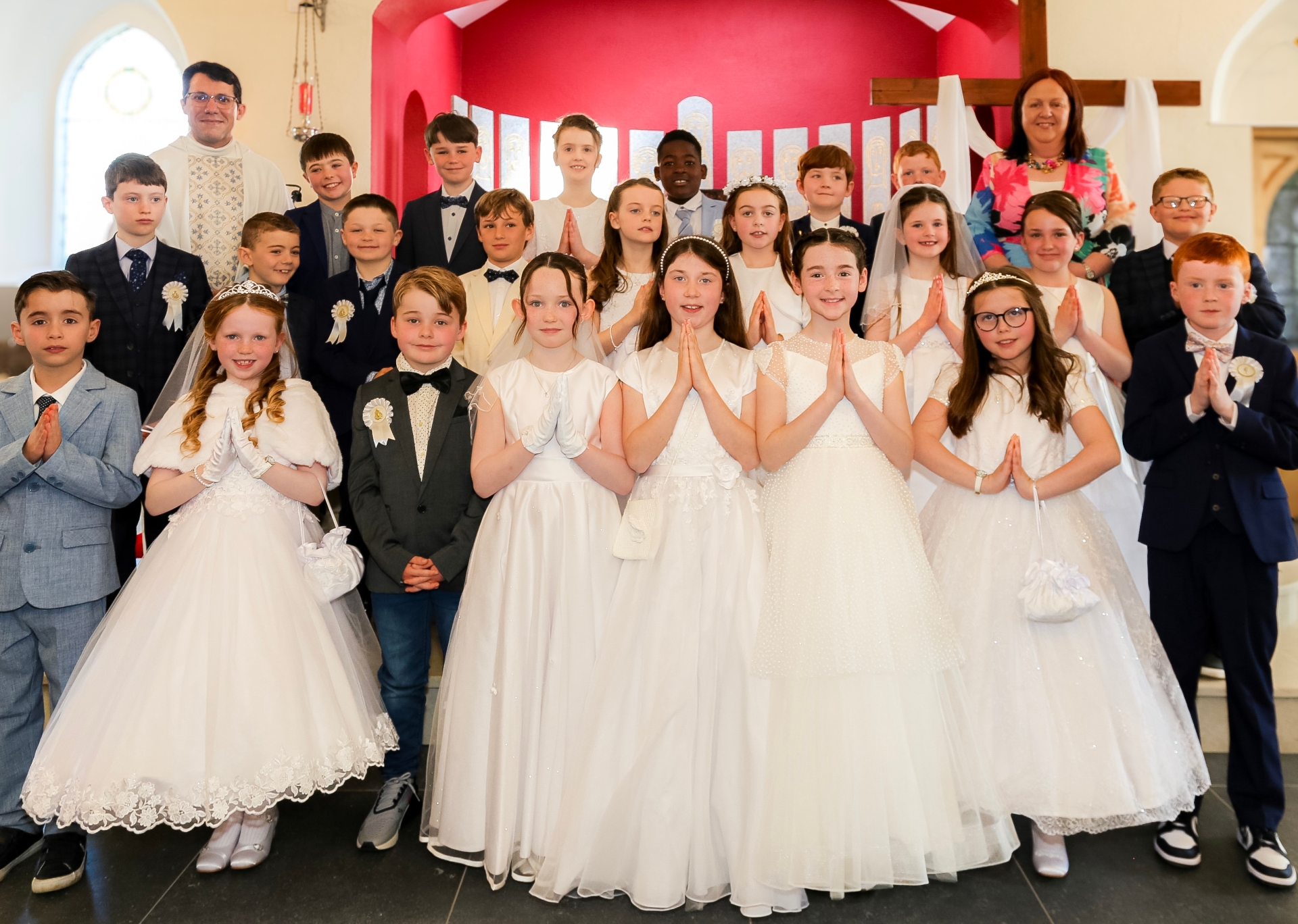 Ratheniska Communion Class 2024 with Fr. Adriano and Teacher Ms. Byrne